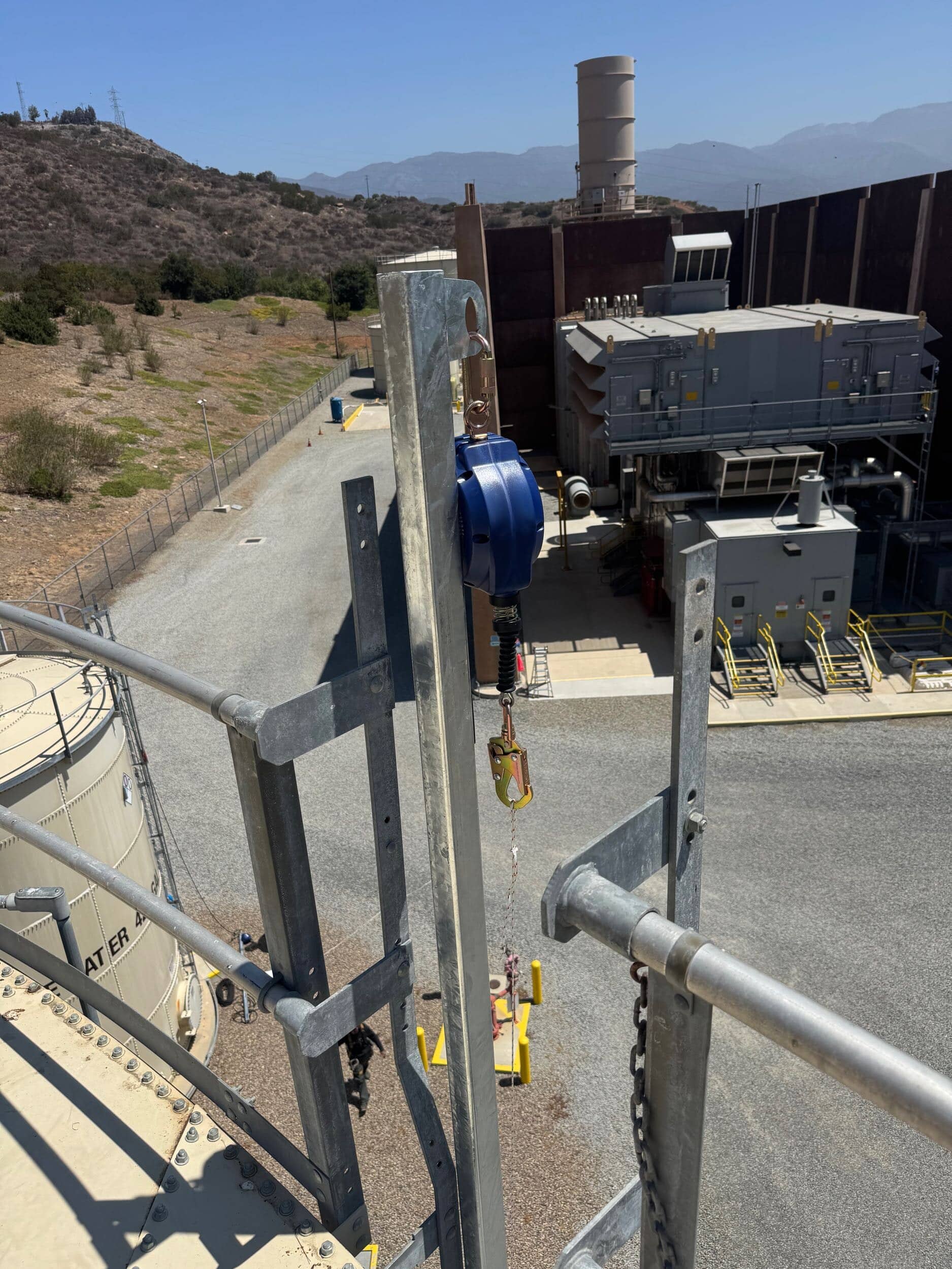ladder anchor with srl on top of water tower in california