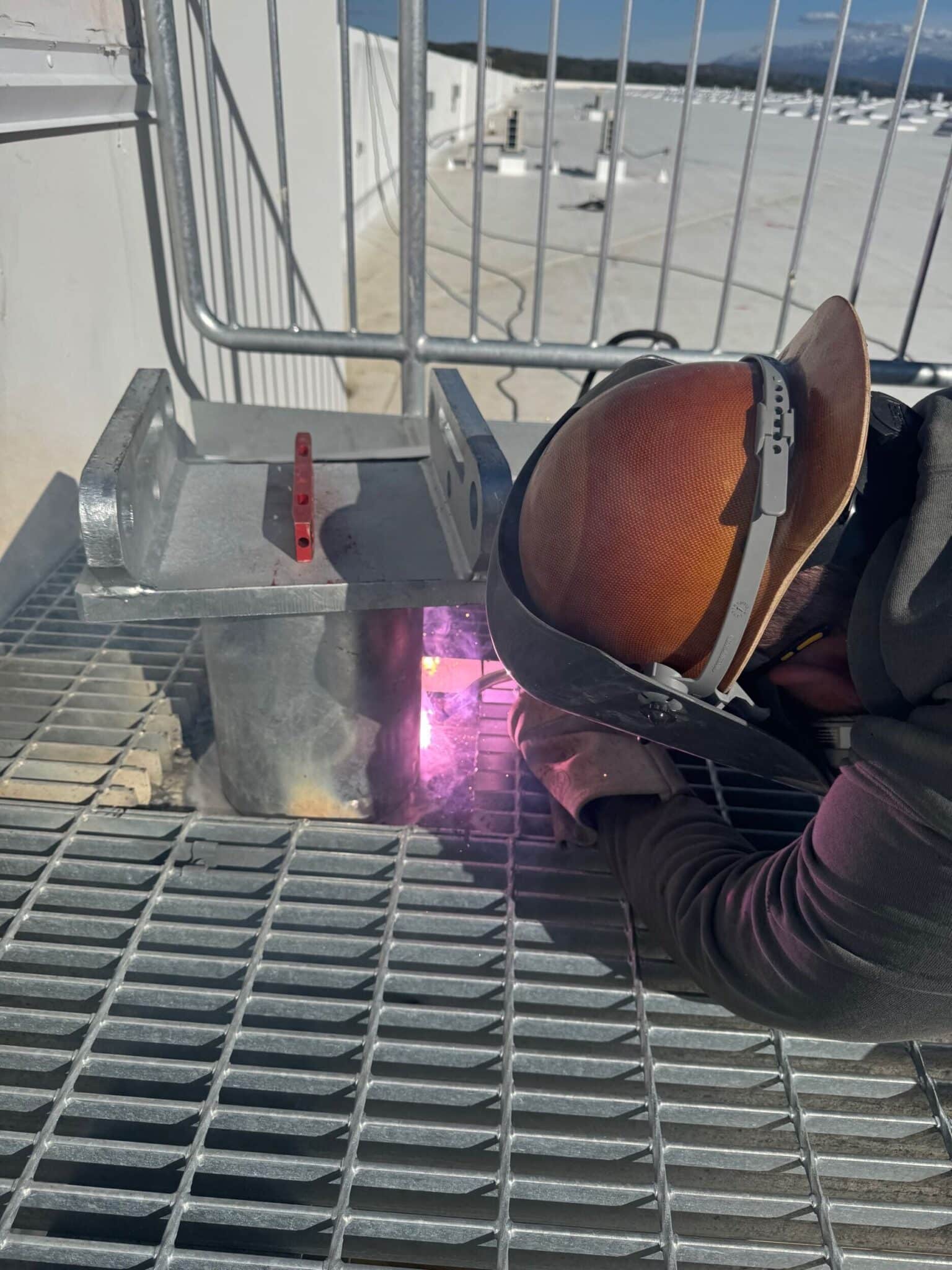 Certified welding of facade access anchor points for suspended access system